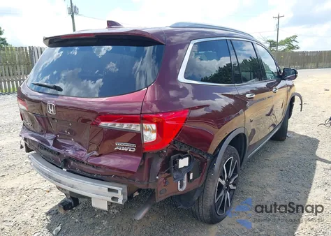 2019 Honda Pilot Touring z USA, uszkodzony, nr VIN 5FNYF6H61KB009596